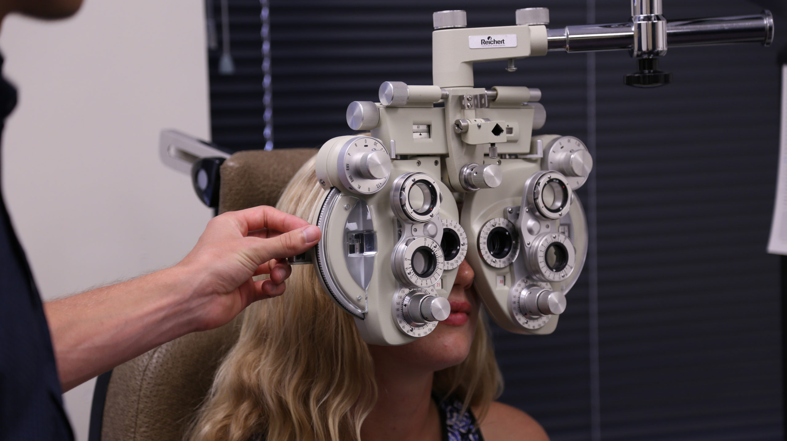 An Image of a Female Getting an Eye Assessment at the Wellington Eye Centre